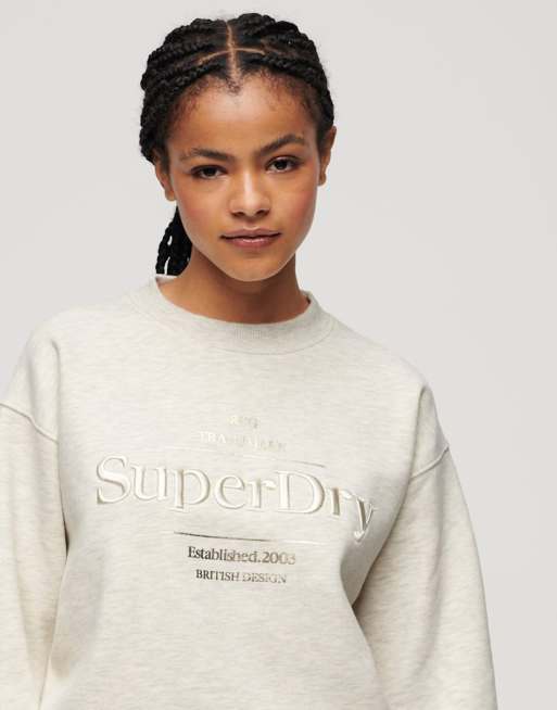 Superdry - Sweat avec logo métallisé luxueux - Avoine chiné