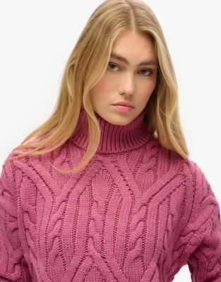 Superdry - Twist - Rollkragenpullover mit Zopfmuster in der Farbe Papaya Pink Twist-Rosa