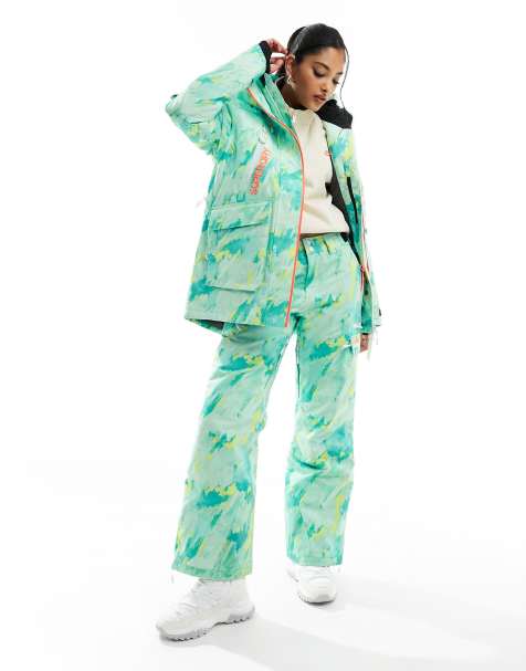Superdry – Ultimate Rescue – Skihose mit abstraktem Muster in Blau- und Limettengrün - view 1