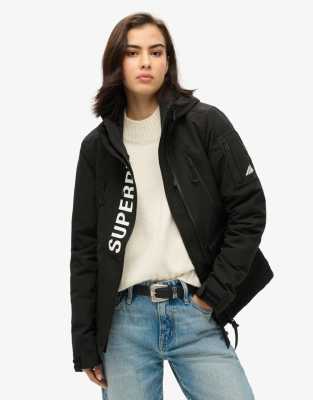 Superdry - Ultimate SD-Windcheater - Jacke in Tiefschwarz/Optik mit Kapuze