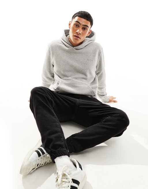 Superdry – Vintage-Kapuzenpullover in meliertem verwaschenem College-Grau