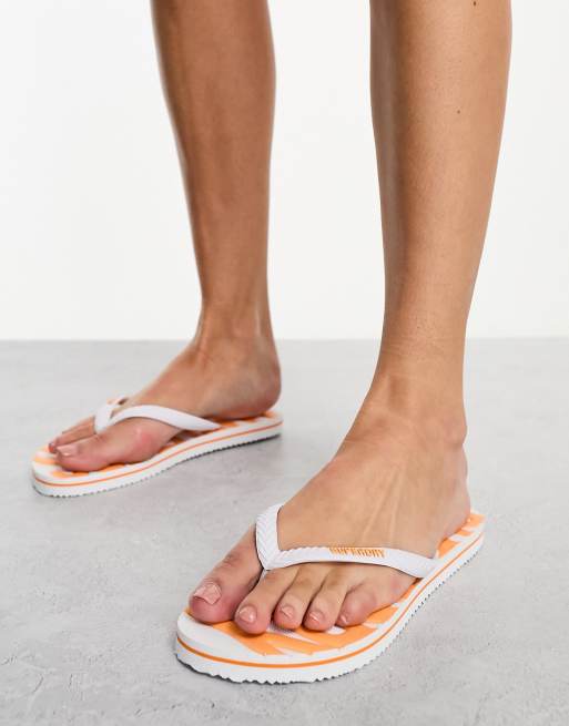 Superdry vintage vegan flip flops in white ASOS