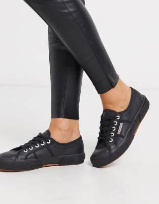 black leather plimsolls