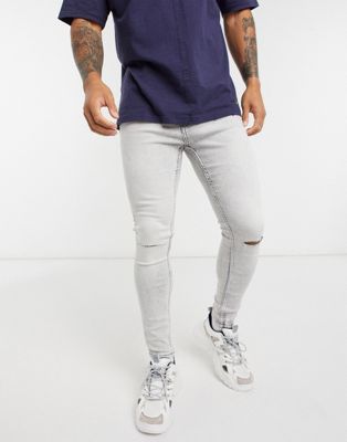фото Супероблегающие джинсы с рваными коленями bershka-серый