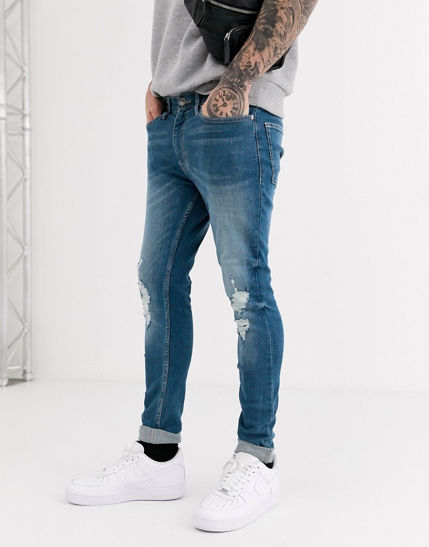 фото Суперзауженные синие джинсы с рваной отделкой new look-синий