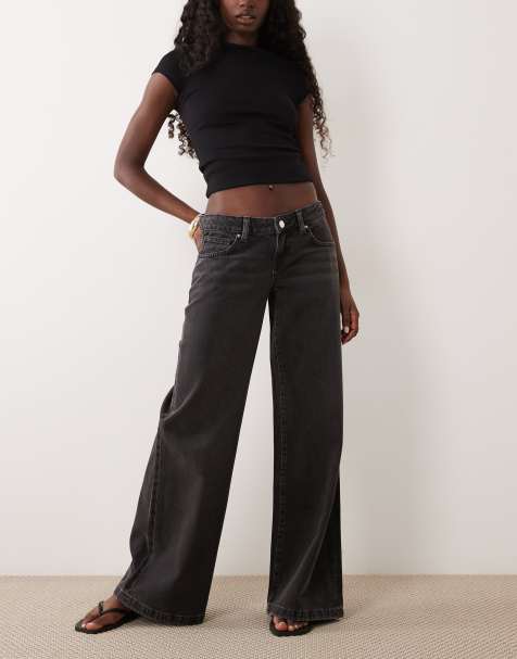 Supré ultra low rise baggy jeans in black - view 1