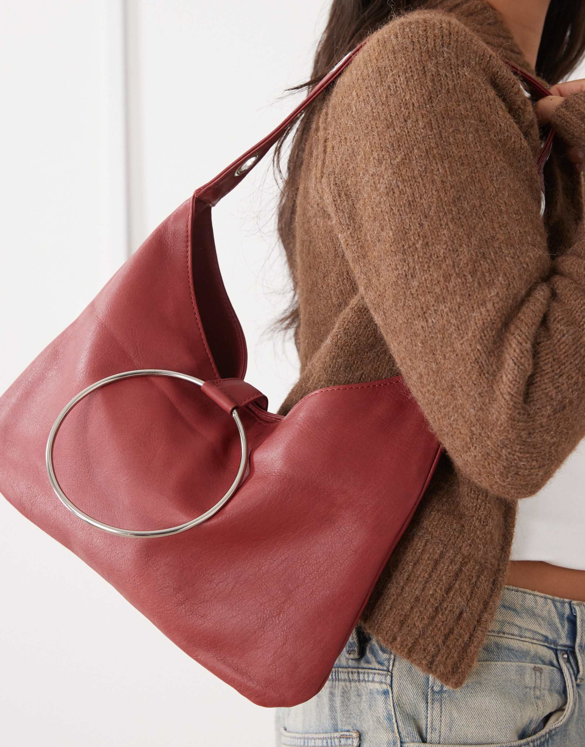 susmie's ali suede shoulder bag with ring detail in deep red