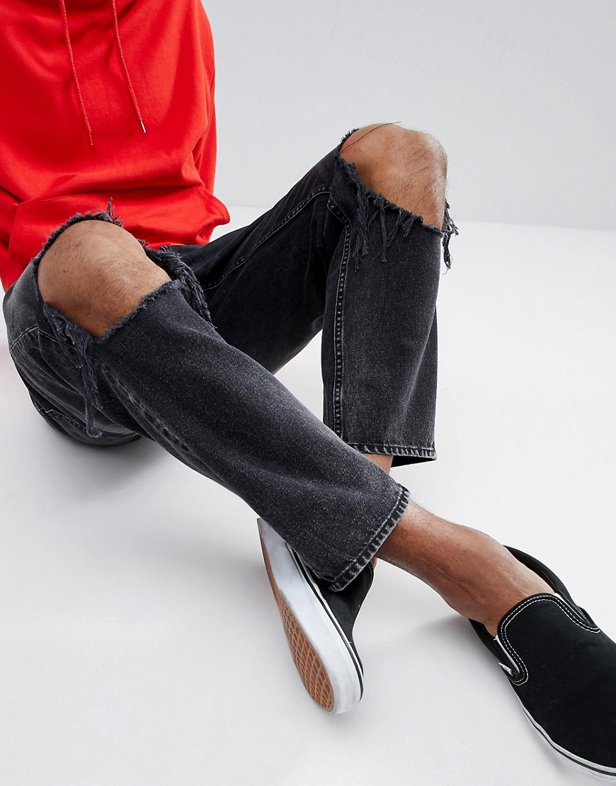 фото Суженные книзу джинсы с рваными коленями cheap monday-черный