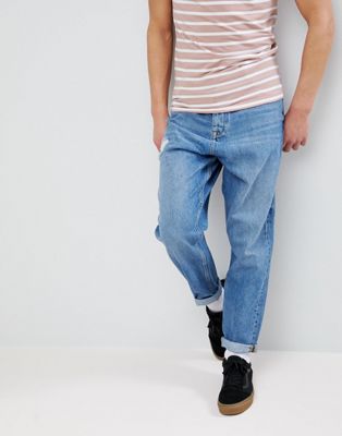 фото Суженные книзу оверсайз-джинсы с рваной отделкой asos-синий asos design