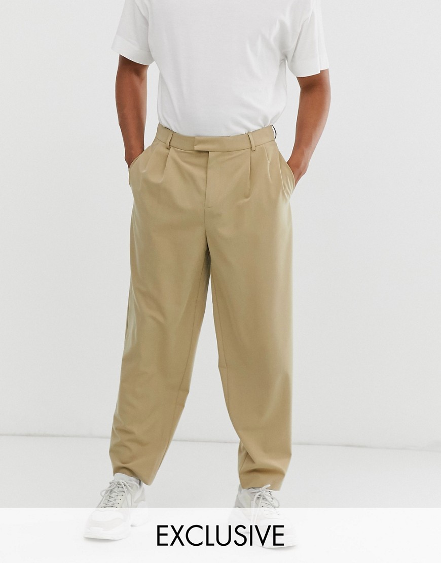 фото Светло-бежевые брюки со свободными штанинами collusion-светло-бежевый