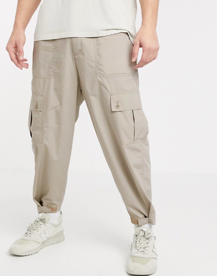 фото Светло-бежевые широкие брюки карго asos design-бежевый
