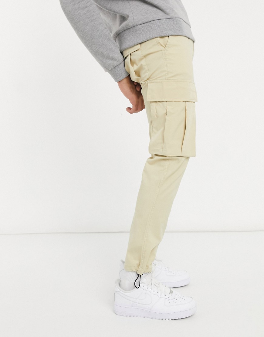фото Светло-бежевые узкие брюки карго с поясом topman-светло-бежевый