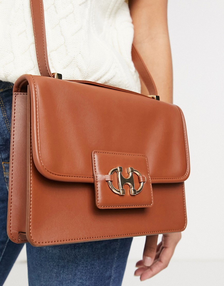 фото Светло-коричневая сумка-портфель в стиле 70-х с фурнитурой в виде трензеля asos design-коричневый цвет