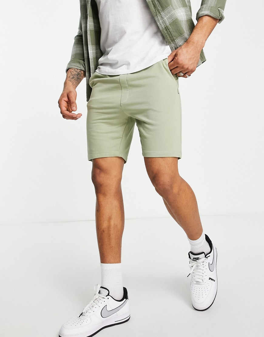 фото Светло-зеленые трикотажные шорты узкого кроя jack & jones essentials-зеленый цвет