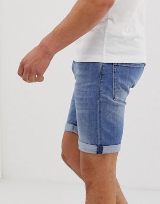 фото Светлые джинсовые шорты зауженного кроя replay-синий