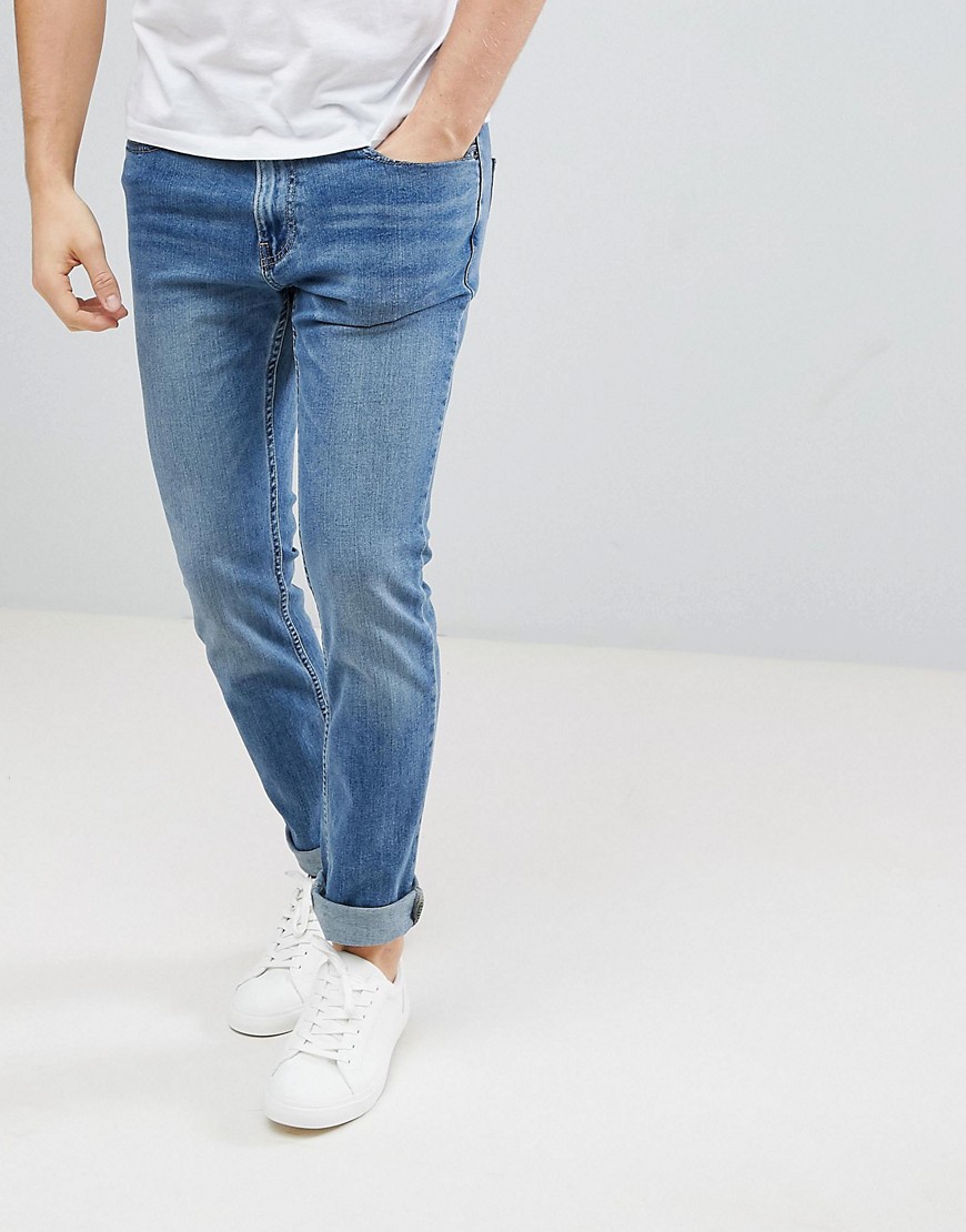 фото Светлые джинсы скинни hollister-синий