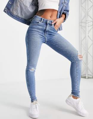 фото Светлые выбеленные джинсы супероблегающего кроя с рваной отделкой dr denim lexy-голубой