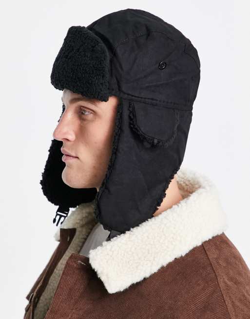 ASOS DESIGN trapper hat with badge in brown faux fur