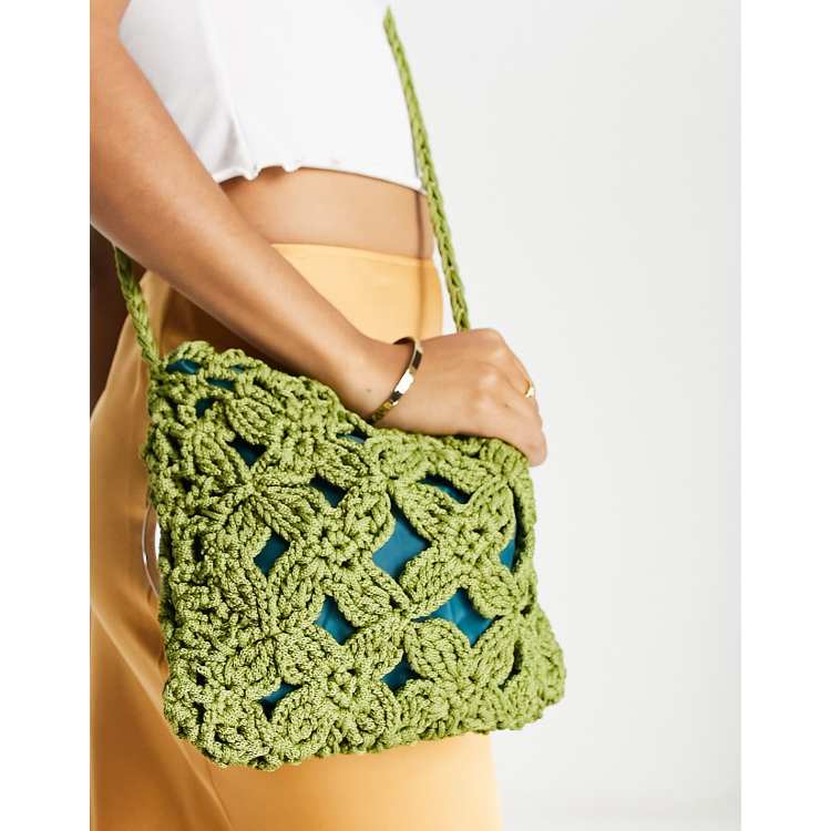 SVNX braided cotton cross body bag with wooden handle in green