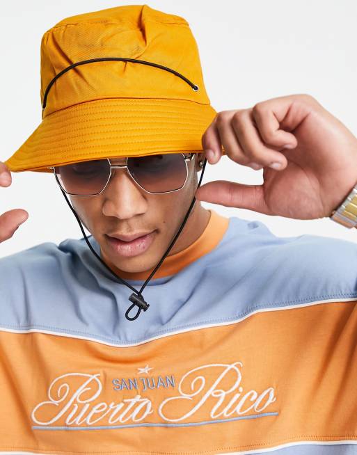 SVNX - Campground - Bucket hat met trekkoord in oranje