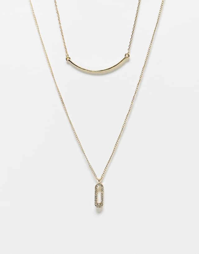 SVNX double layered necklace with crystal pendant in gold