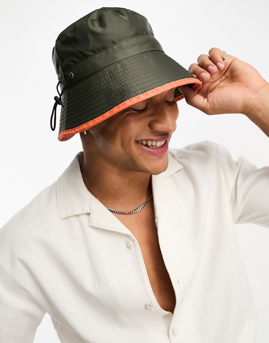 SVNX nylon bucket hat with contrast trim in moss green