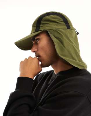 SVNX nylon cap with neck flap in moss green | ASOS