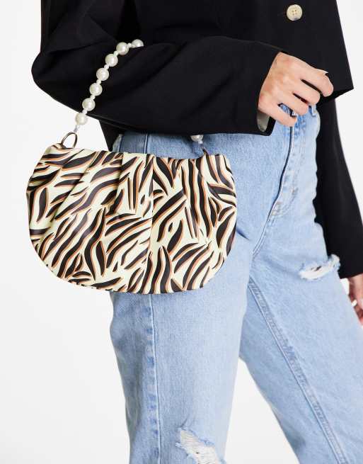 SVNX pearl handle mini bag in animal print, 4 of 4