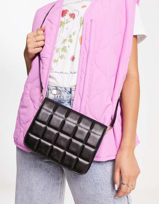 SVNX quilted padded crossbody bag in black ASOS
