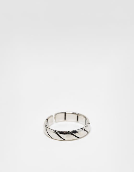 SVNX – Ring in Silber mit goldenen und schwarzen Details