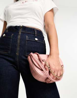 SVNX SVNX shoulder bag with chain strap detail in peach-Orange