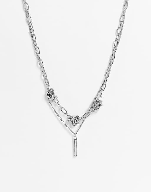 SVNX – Silverfärgat halsband med flera rader och taggtrådsdetalj