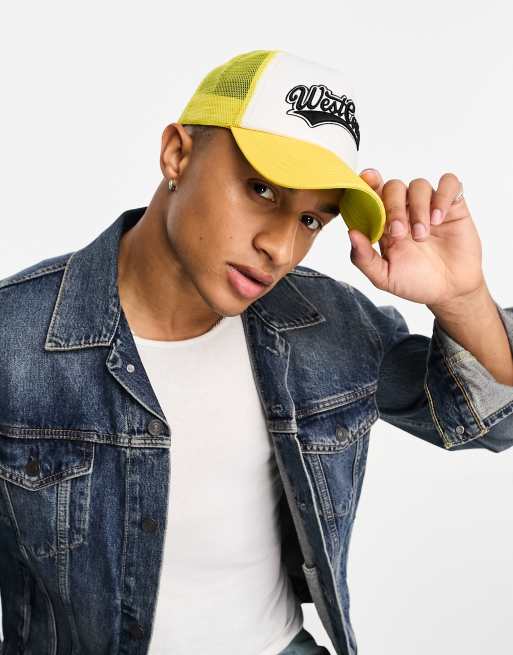 SVNX slogan trucker cap in yellow | ASOS
