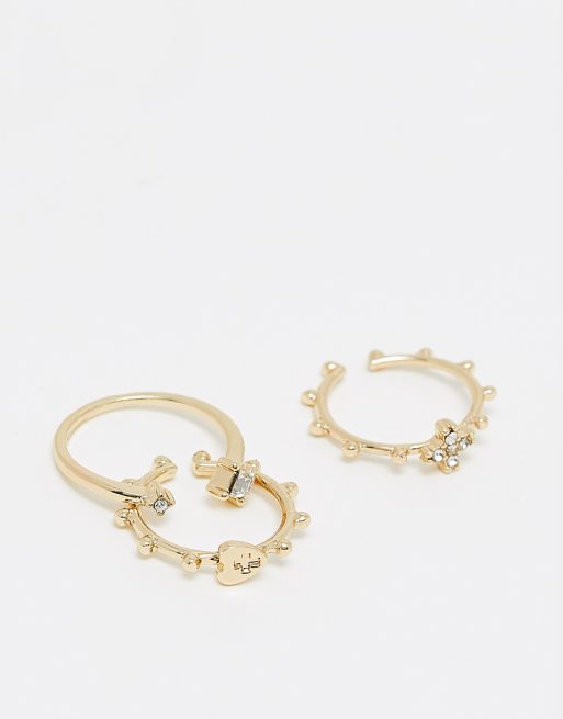SVNX three pack rings in gold with gem details