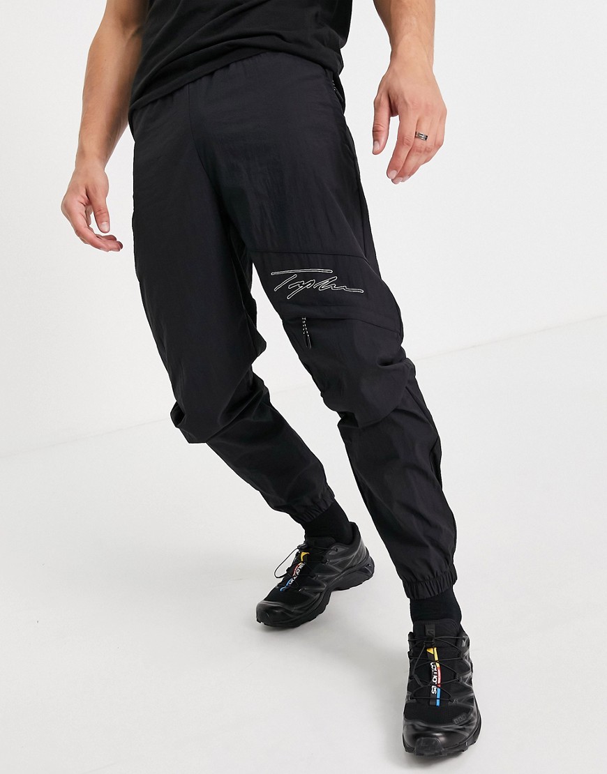 фото Свободные черные брюки карго с декоративной строчкой и логотипом-подписью topman-черный цвет