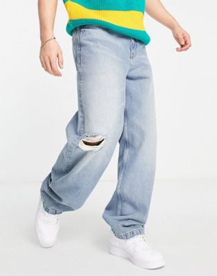 фото Свободные джинсы светло-голубого выбеленного цвета с рваной отделкой asos design-голубой
