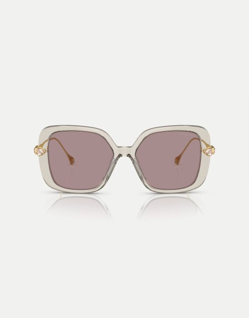 Swarovski – Sk6011 – Rechteckige Sonnenbrille in transparentem Hellbraun mit lila Gläsern