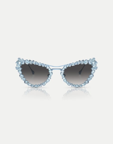 Swarovski Sk7011 irregular sunglasses with grey lens in matte light blue - view 1