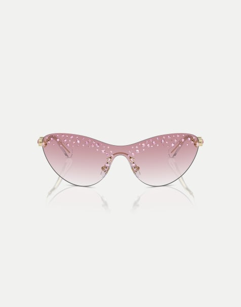 Swarovski Sk7023 irregular sunglasses with pink lens in pale gold - view 1