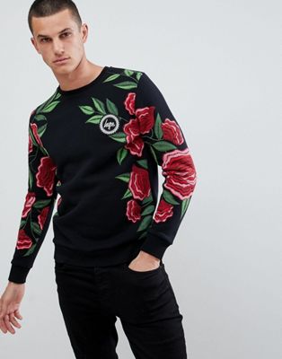 Sweatshirt med rosenprint fra Hype-Sort