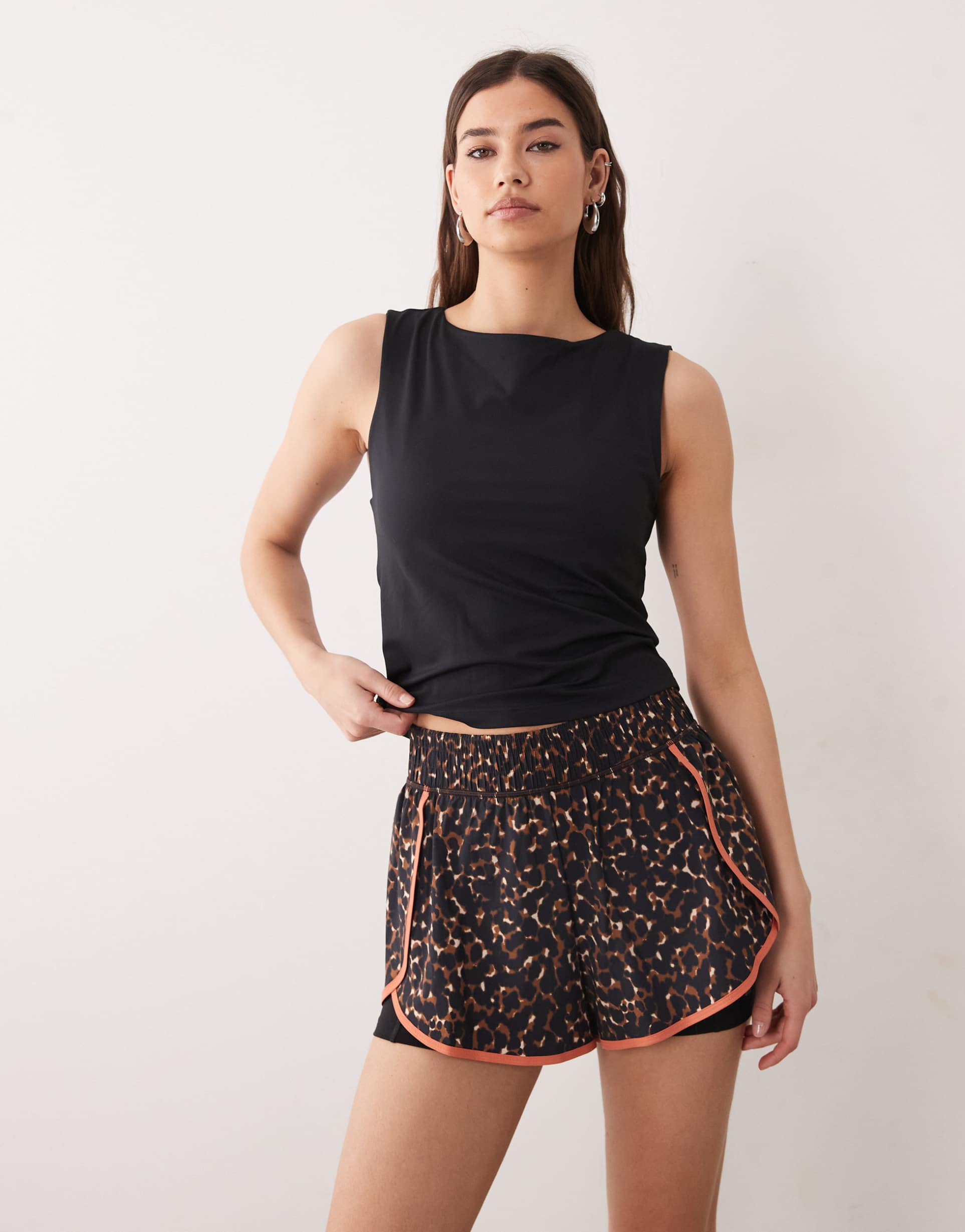 sweaty betty 2 in 1 training shorts in leopard print