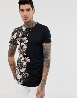 T-shirt med blomstret kranieprint på siden fra Religion-Sort