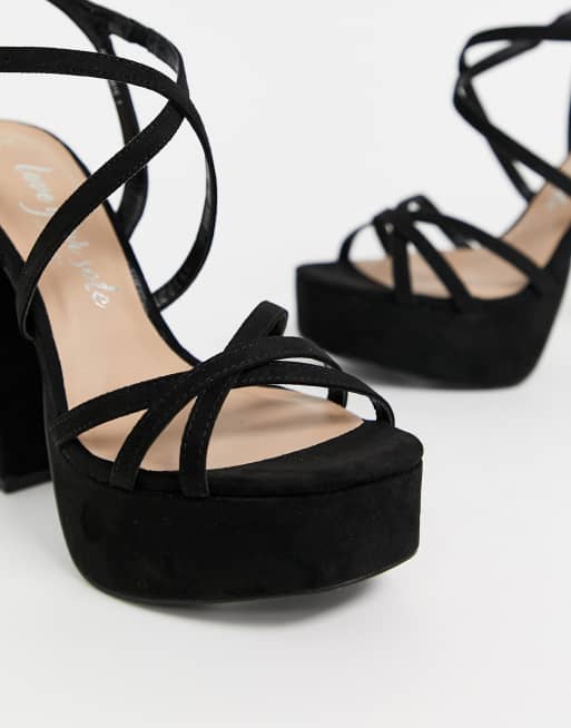 Tacones altos con plataforma y tira en negro de New Look ASOS