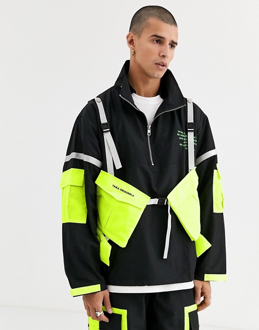 Taka Original utility jacket with reflective taping and neon pockets