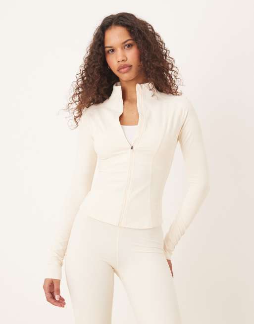 TALA - Chaqueta color crema para correr con cremallera DayFlex