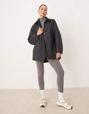 oversized reversible fleece and quilted jacket in black