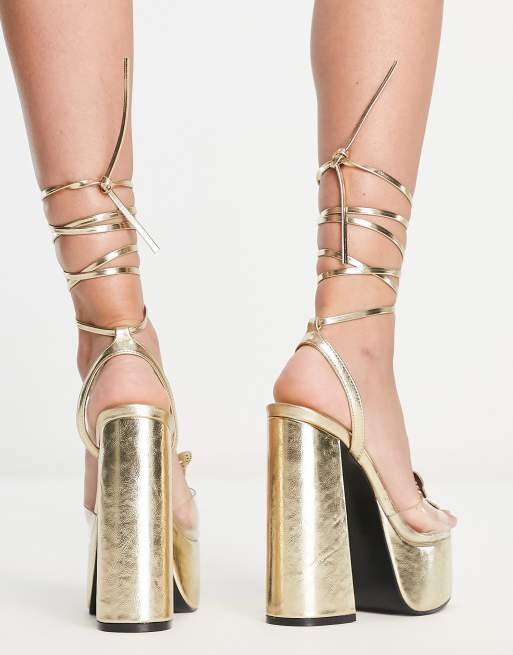 Gold sparkly platform store heels