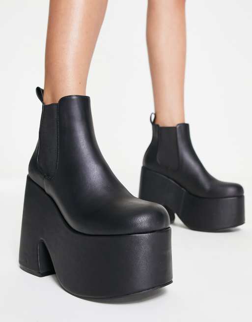 Black wedge sale platform ankle boots