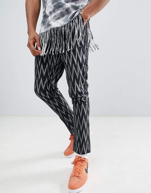 Tapered festivalbukser i sort aztekerprint fra ASOS DESIGN