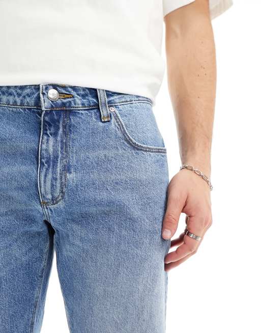 Tapered fit-jeans i let forvasket blå fra ASOS DESIGN, 5 af 5